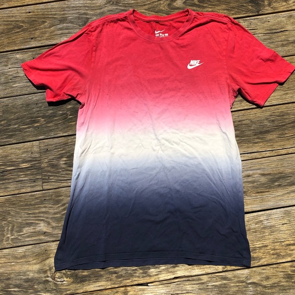 white red and blue nike shirt